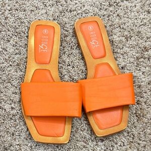 Rouge! Orange Slide Sandals with Gold Accents